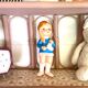 Pale pink rattan wall shelf