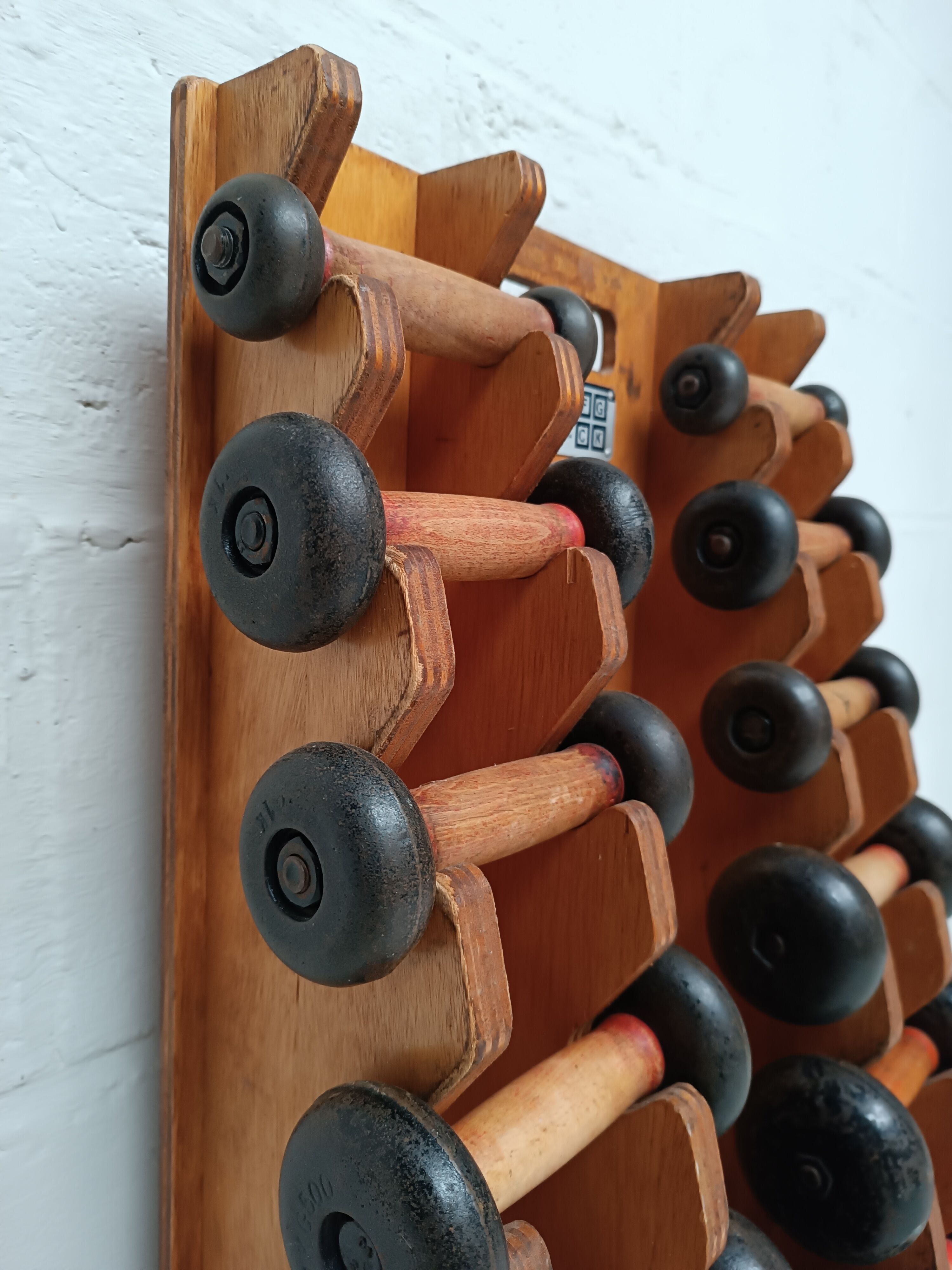 60s dumbbell wall display