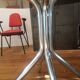 Smoked glass round table and chrome foot