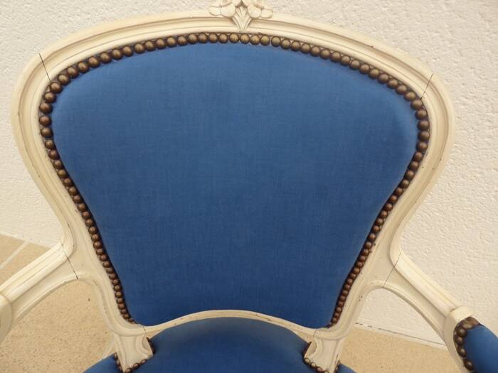Cabriolet armchair in lacquered wood trimmed in blue satin, Louis XV style