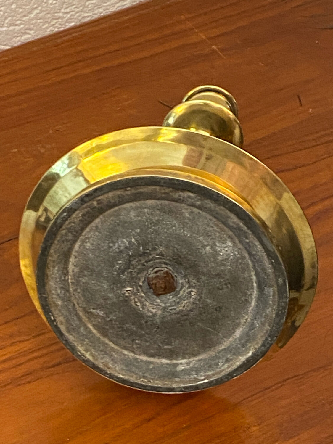 Compartmentalised brass candlestick
