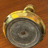 Compartmentalised brass candlestick