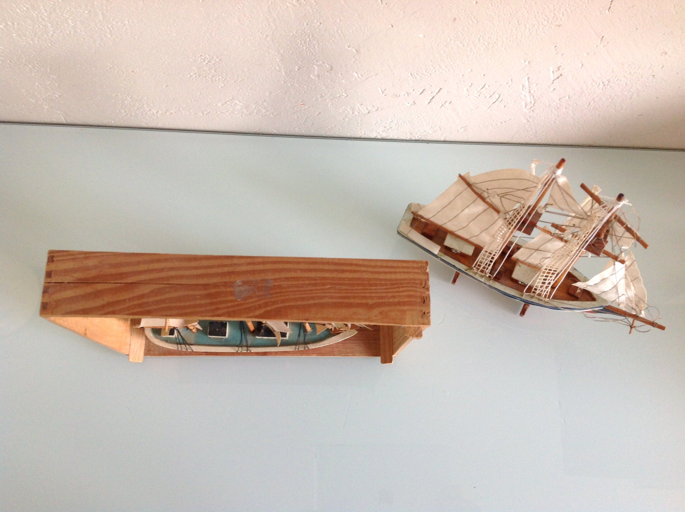 Two old wooden model boats