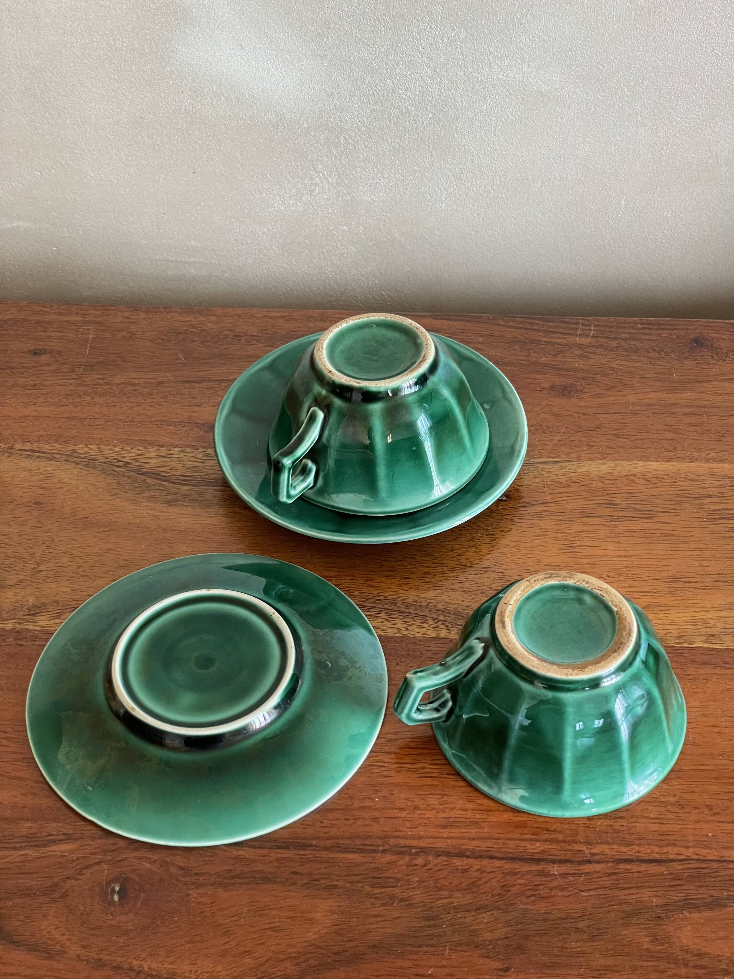 Duo of green ceramic cups