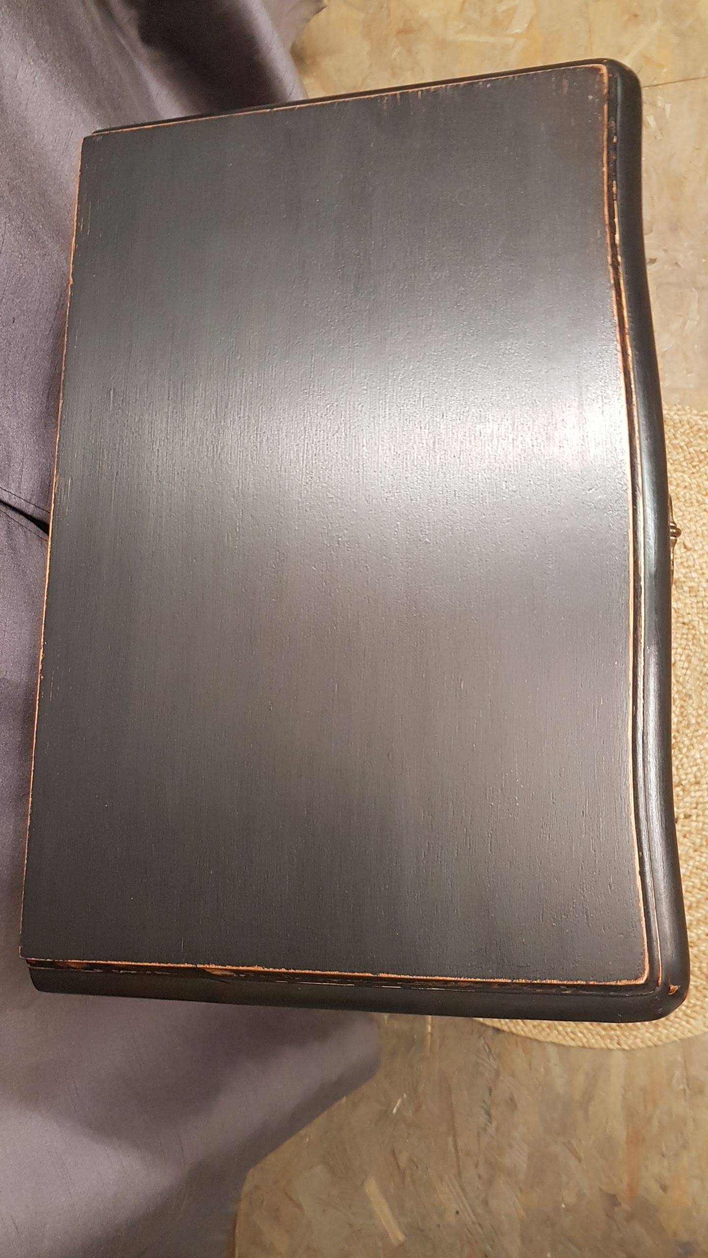 Cherry wood chest of drawers with 5 drawers in aged black.