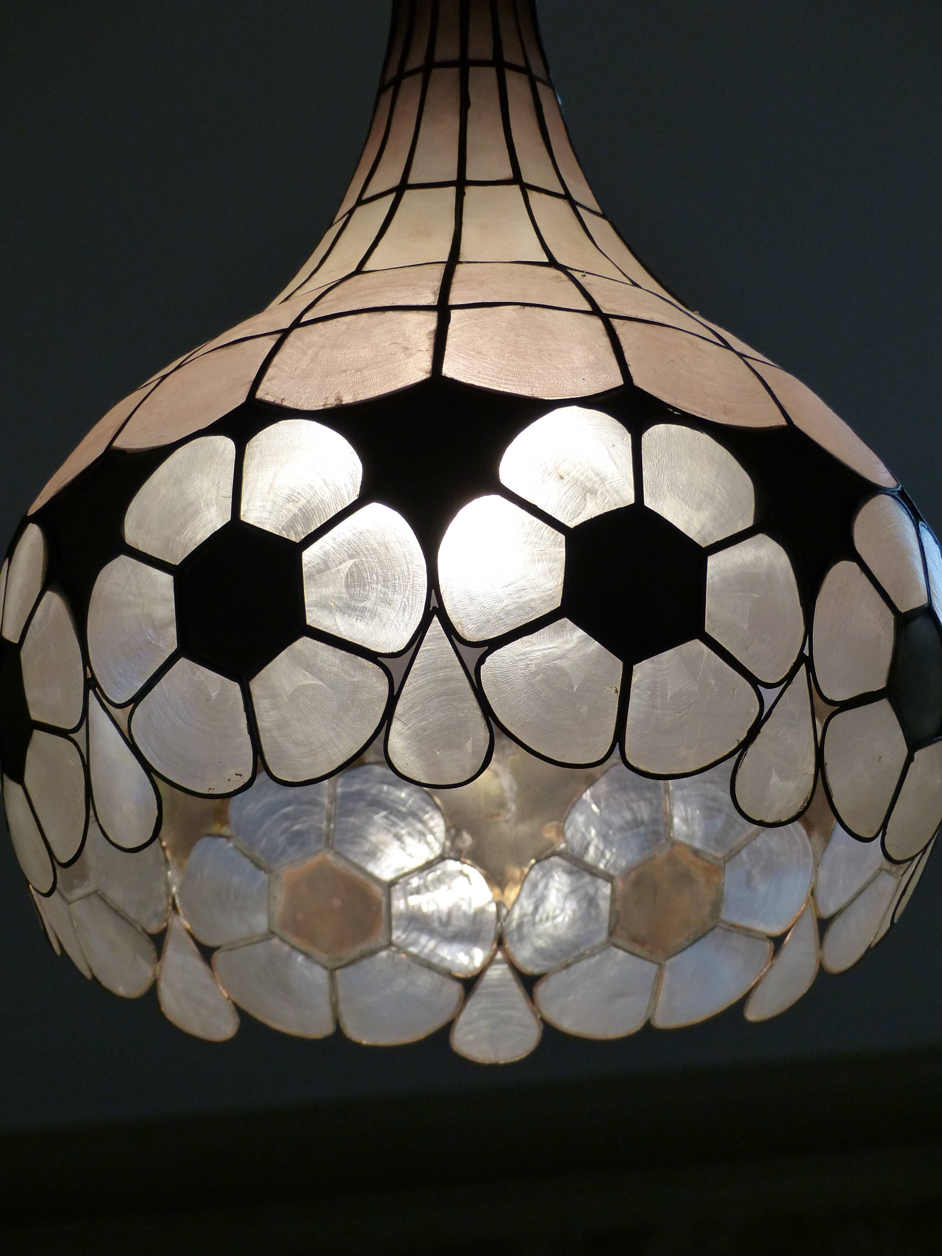 Colorful mother-of-pearl chandelier and brass