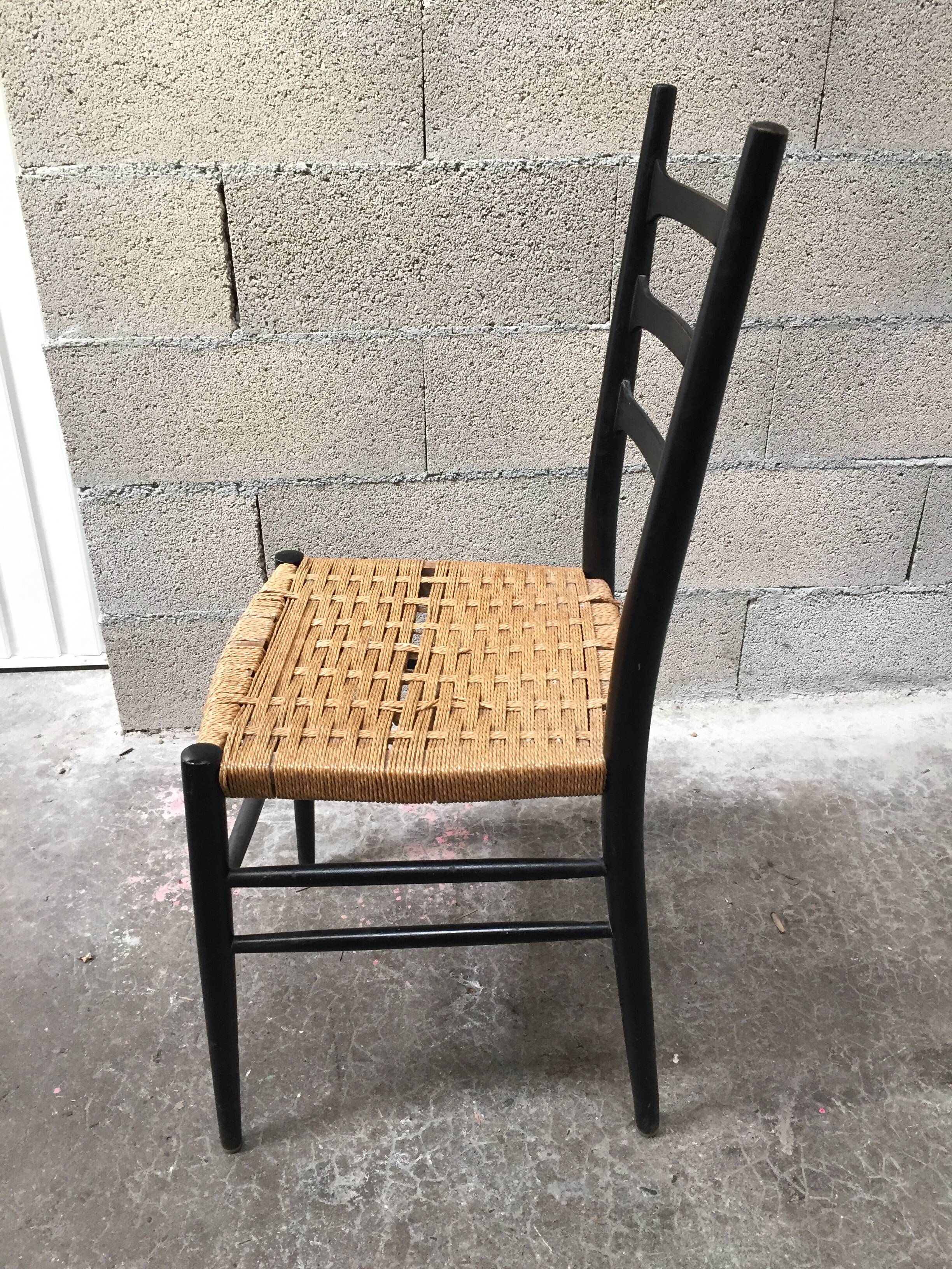 Set of 7 blackened wooden chairs, 1960s vintage