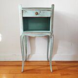 Patinated bedside table end of sofa