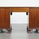 Antique English wooden desk from the late 19th century with a leather top