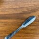 Shell butter dish with vintage knife, silver metal and white insert