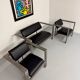 Brutalist living room with faux metal armchairs designed by Karl Friedrich Forster