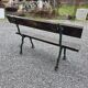 Cast iron garden bench with solid oak seat