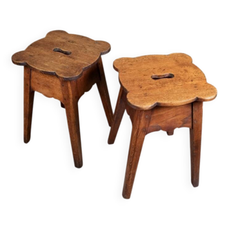 Pair of scalloped oak stools, France, early 20th century