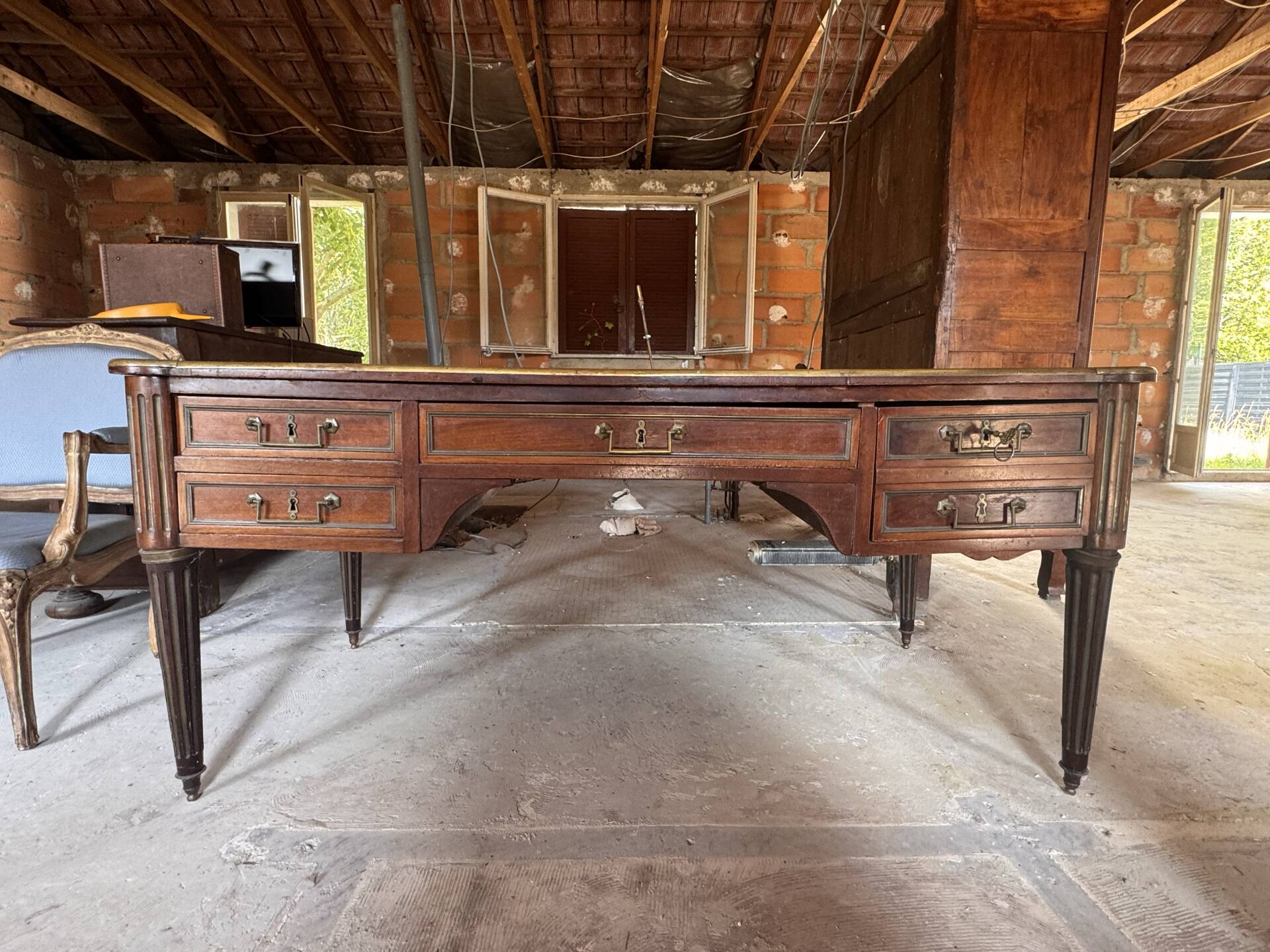 Large flat desk in Louis XVI style made of mahogany, early 20th century.