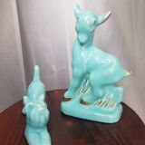 Pair of turquoise zoomorphic statuettes
