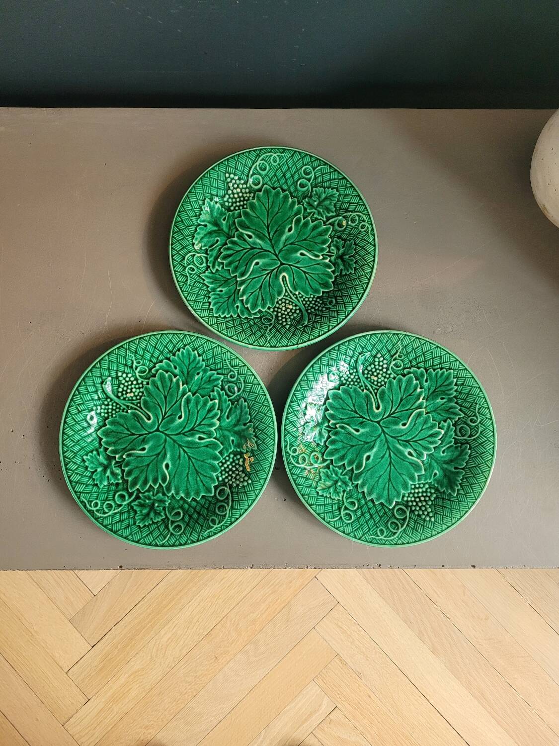 Three green slip plates
