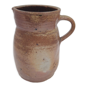 Pitcher in folk art sandstone