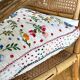 Cushion in hand-embroidered hemp.