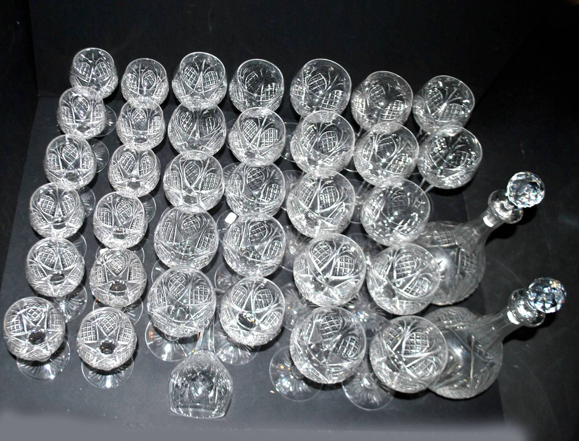 Baccarat set of 35 crystal glasses + 2 flower model carafes 9157 from 1907