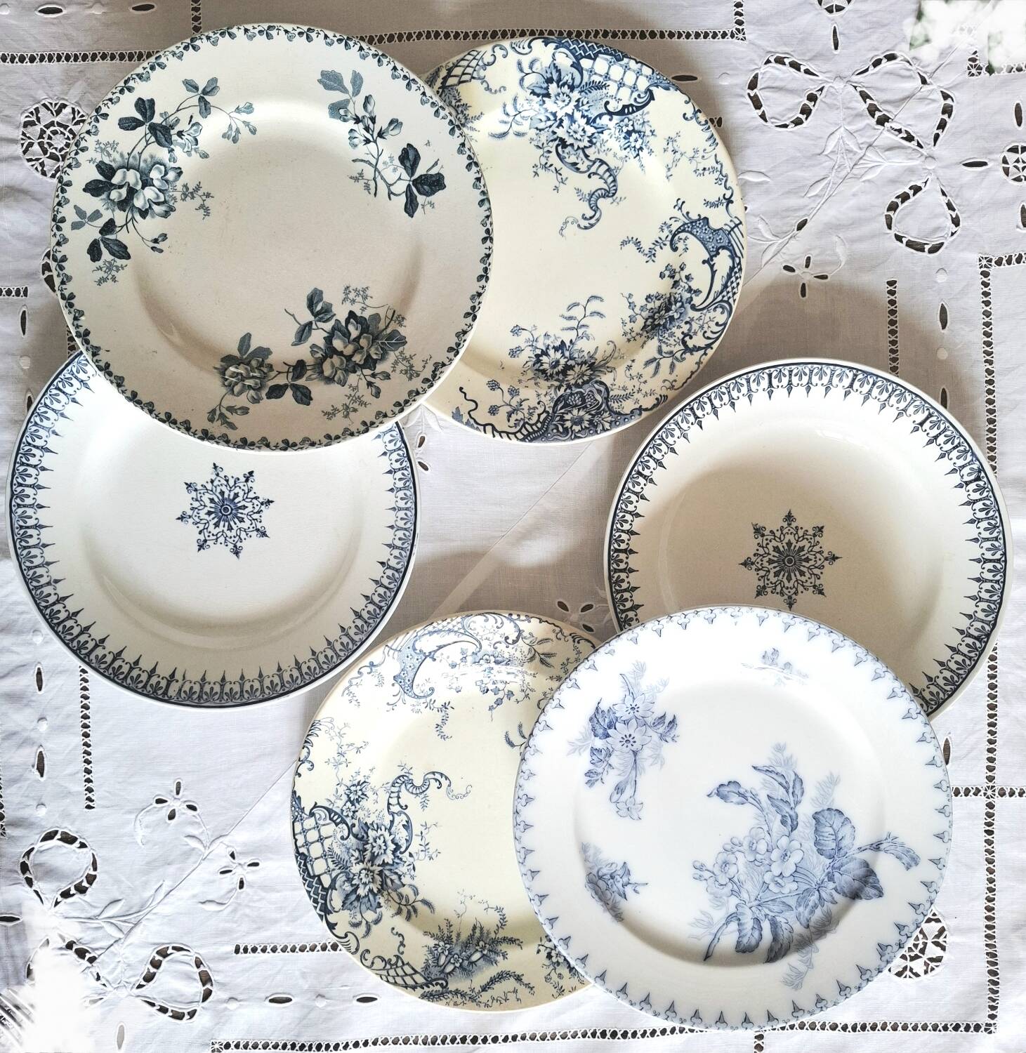 Mismatched antique ironstone dinner plates
