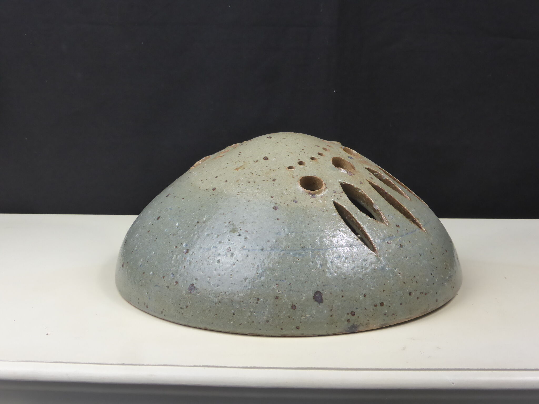 Wall lamp in openwork-vintage round sandstone shape