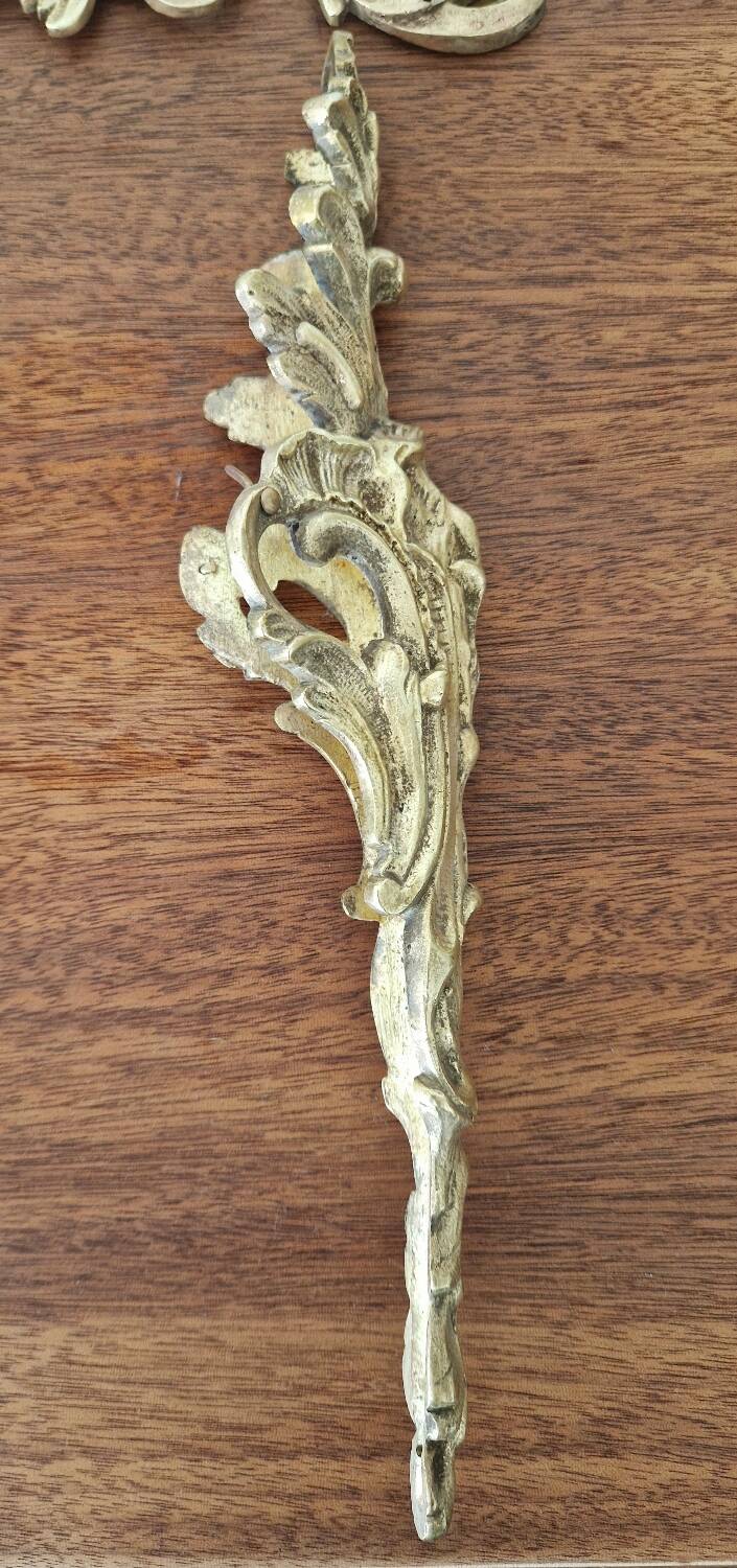 Antique bronze ornaments and pediment