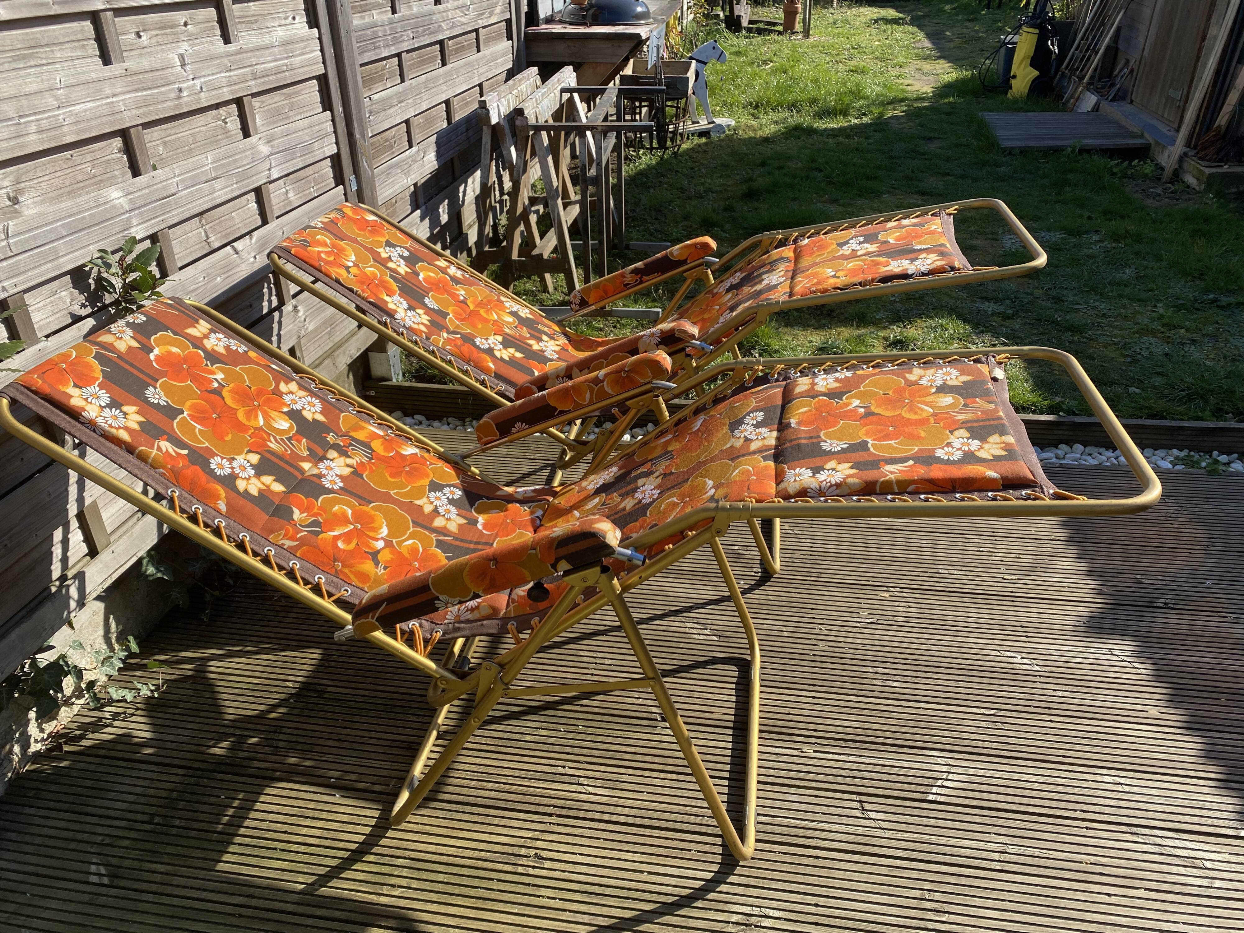 Vintage deckchairs the pair lafuma with flowers