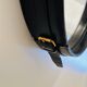 Jacques Adnet pair of circular leather and brass mirrors