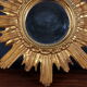 MIroir soleil bois doré et résine 60/70