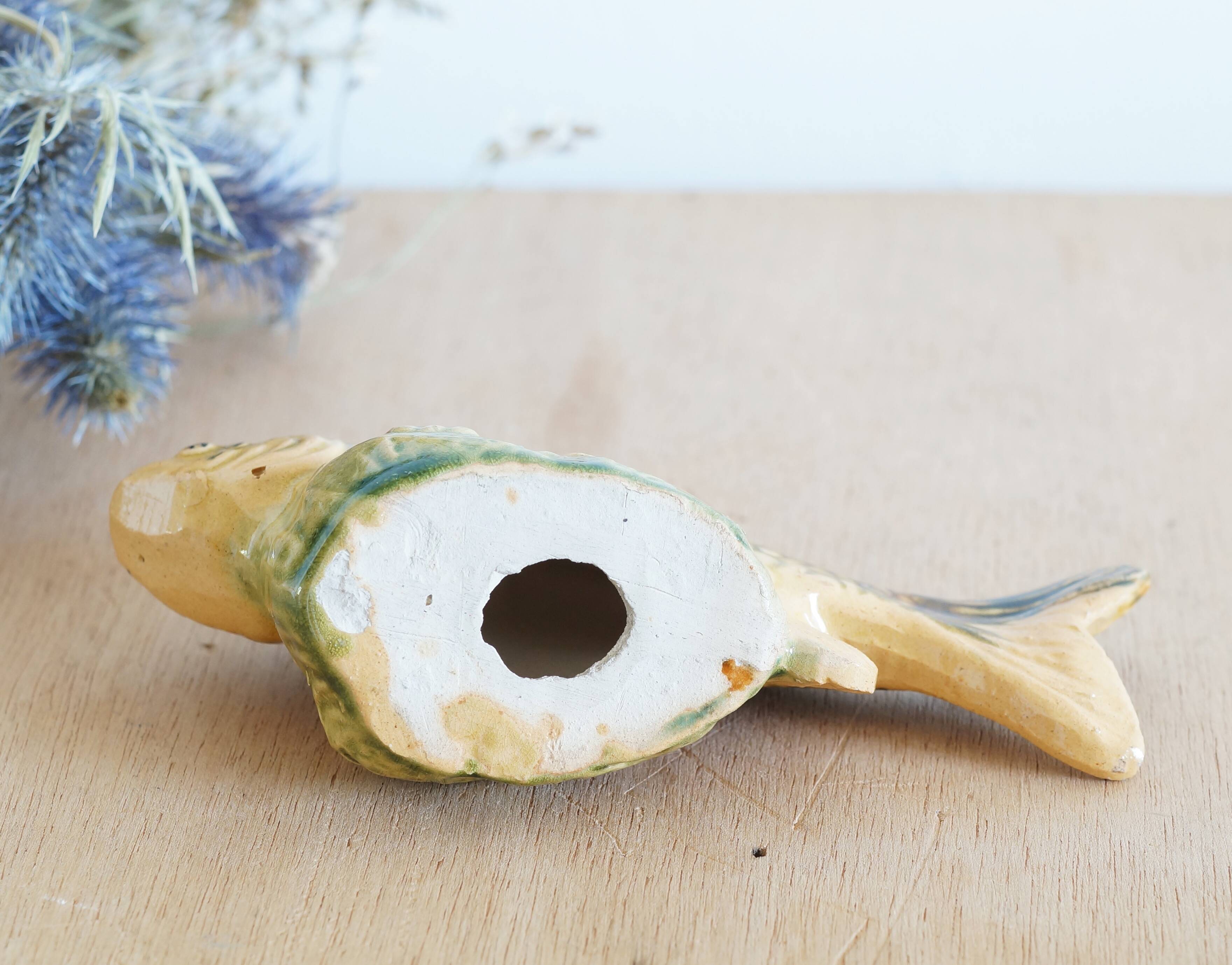 Small earthenware fish figurine