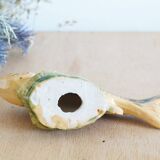 Small earthenware fish figurine