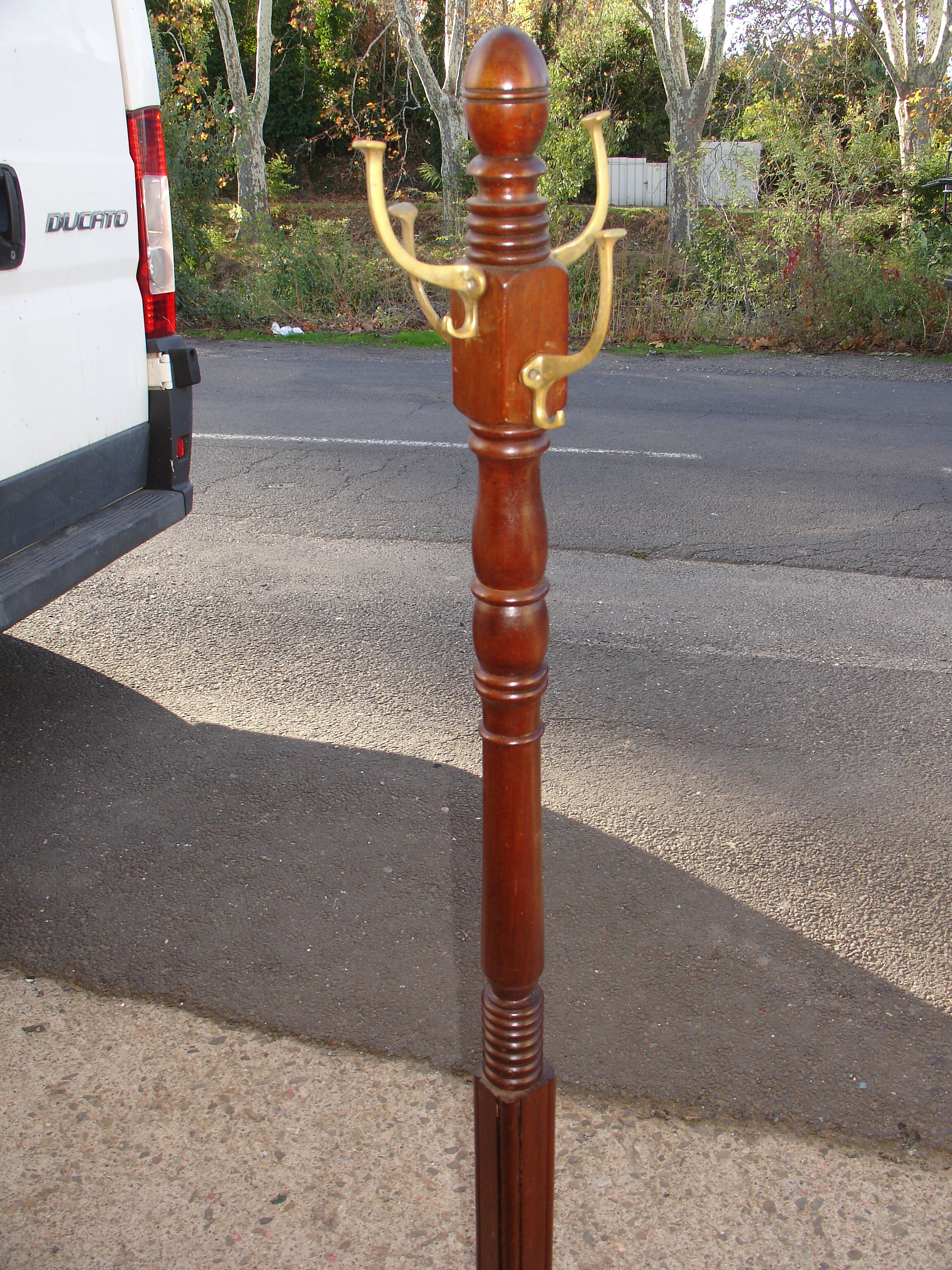 Coat rack known as "Parrot" in mahogany and bronze, circa 1950