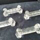 4 large pressed moulded glass knife rests