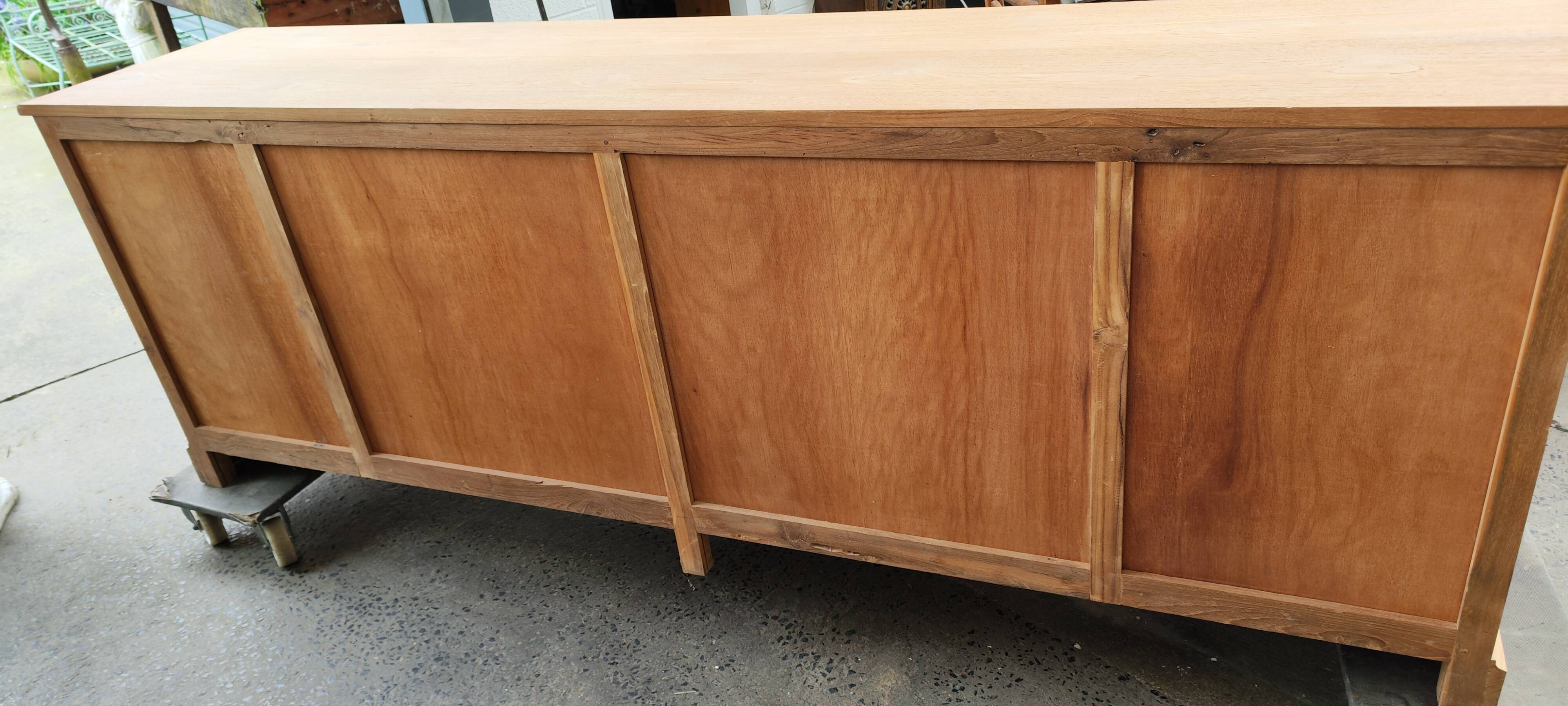 Large four-door row of industrial furniture in raw wood design