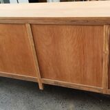 Large four-door row of industrial furniture in raw wood design