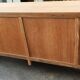 Large four-door row of industrial furniture in raw wood design