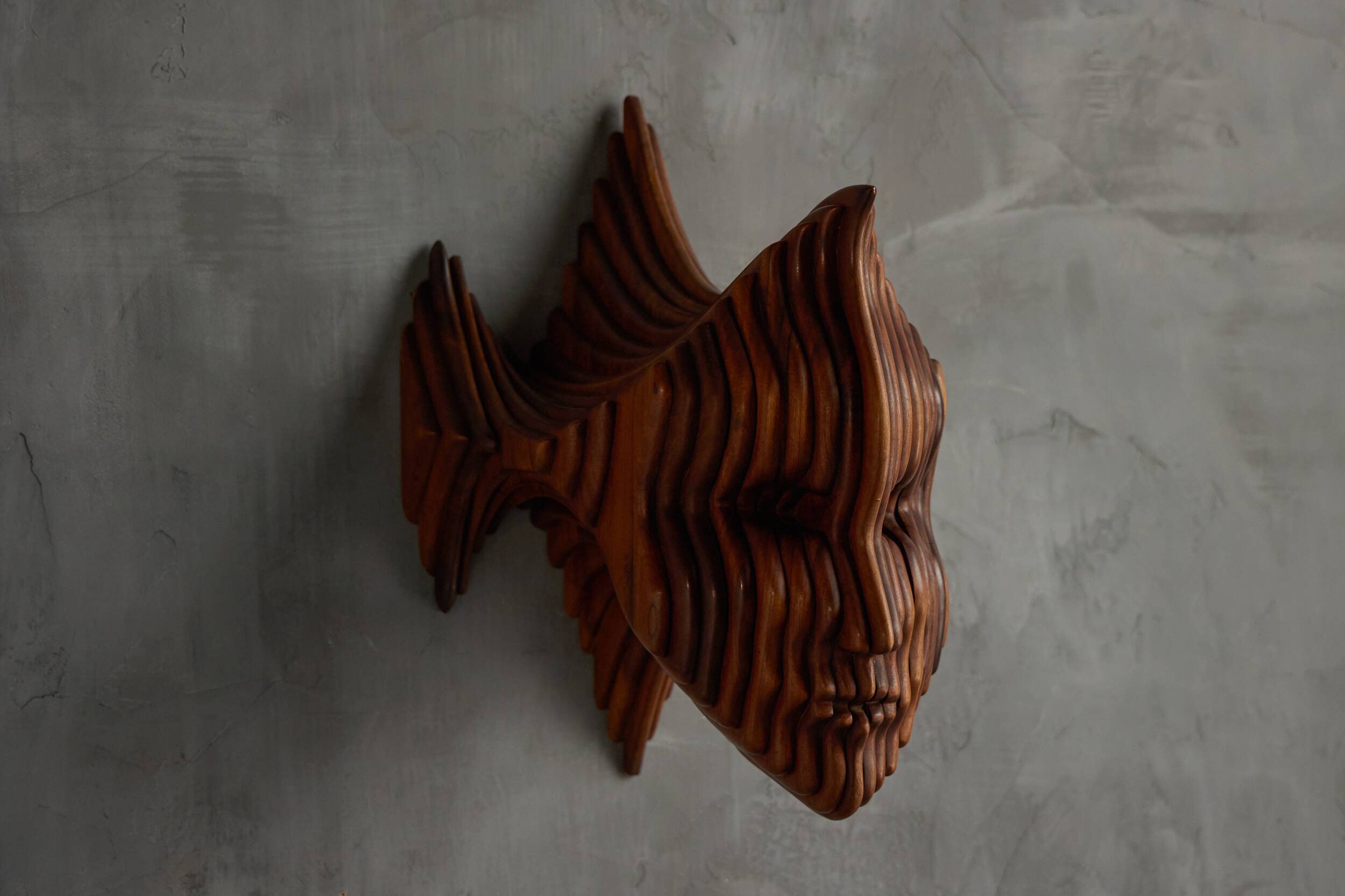 Sculptural carved wooden mask wall panel, France, 1970s
