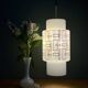 Vintage suspension globe in white opaline with black drawings.