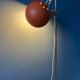 Mid-Century orange floor lamp with "eyeball" shade
