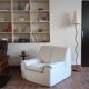Cinna armchair in cream leather, bolstered armrests, 1970s.