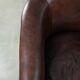 Set of two cowhide club armchairs in good condition with a English design