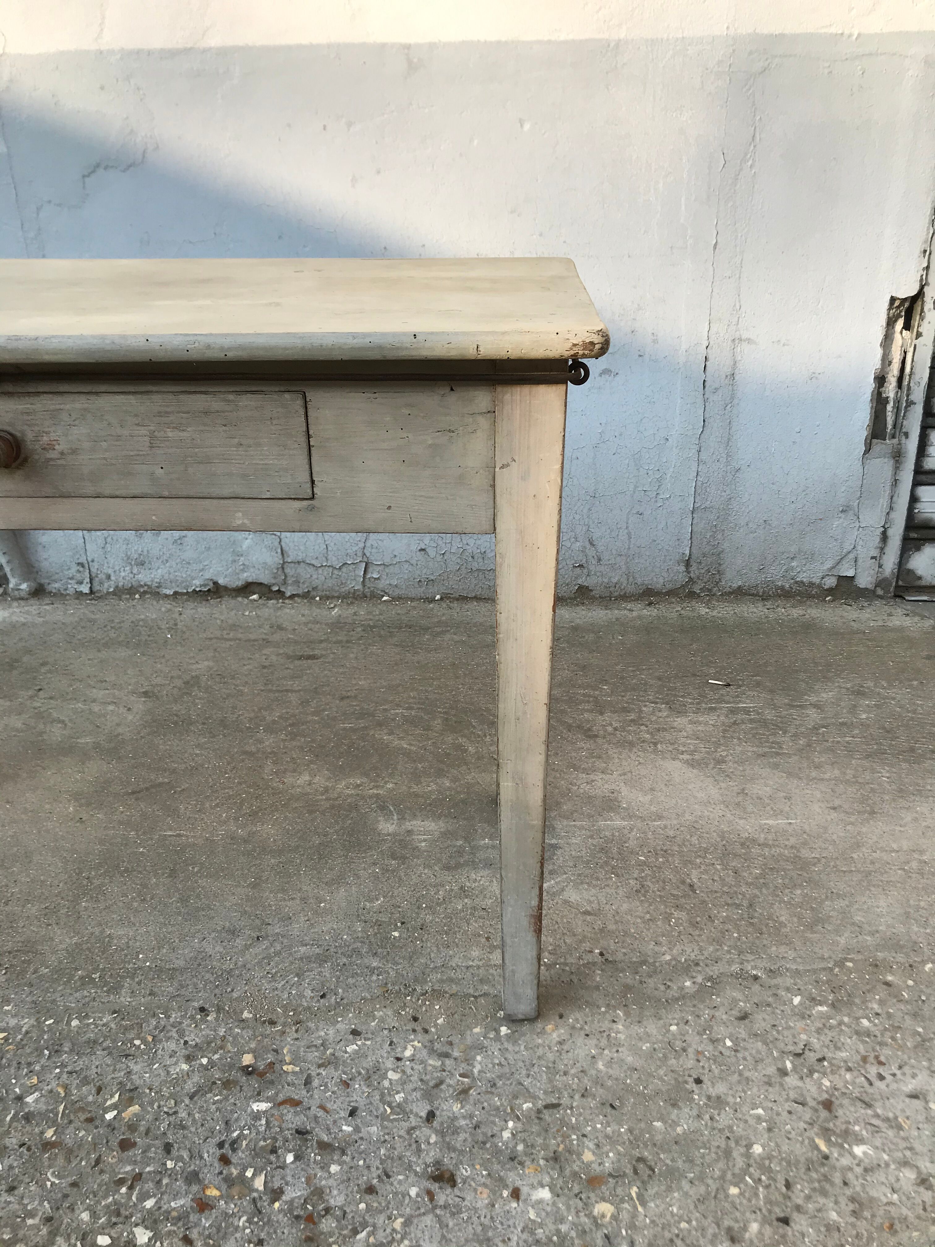 Pale green patinated wooden desk