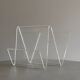 Asymmetrical design magazine rack in transparent acrylic, 70s