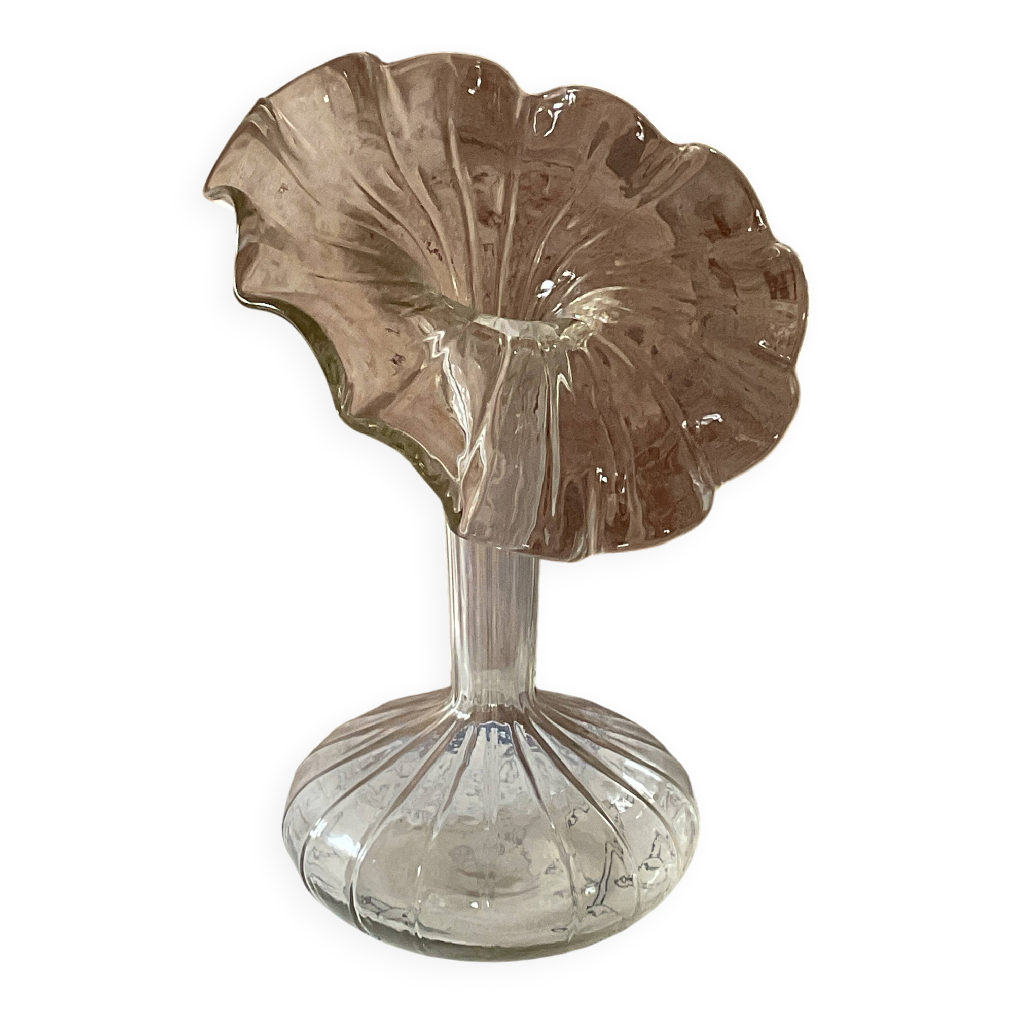 Vintage transparent glass vase in flower shape.