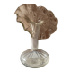 Vintage transparent glass vase in flower shape.