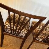 Pair of vintage wood and leopard chairs