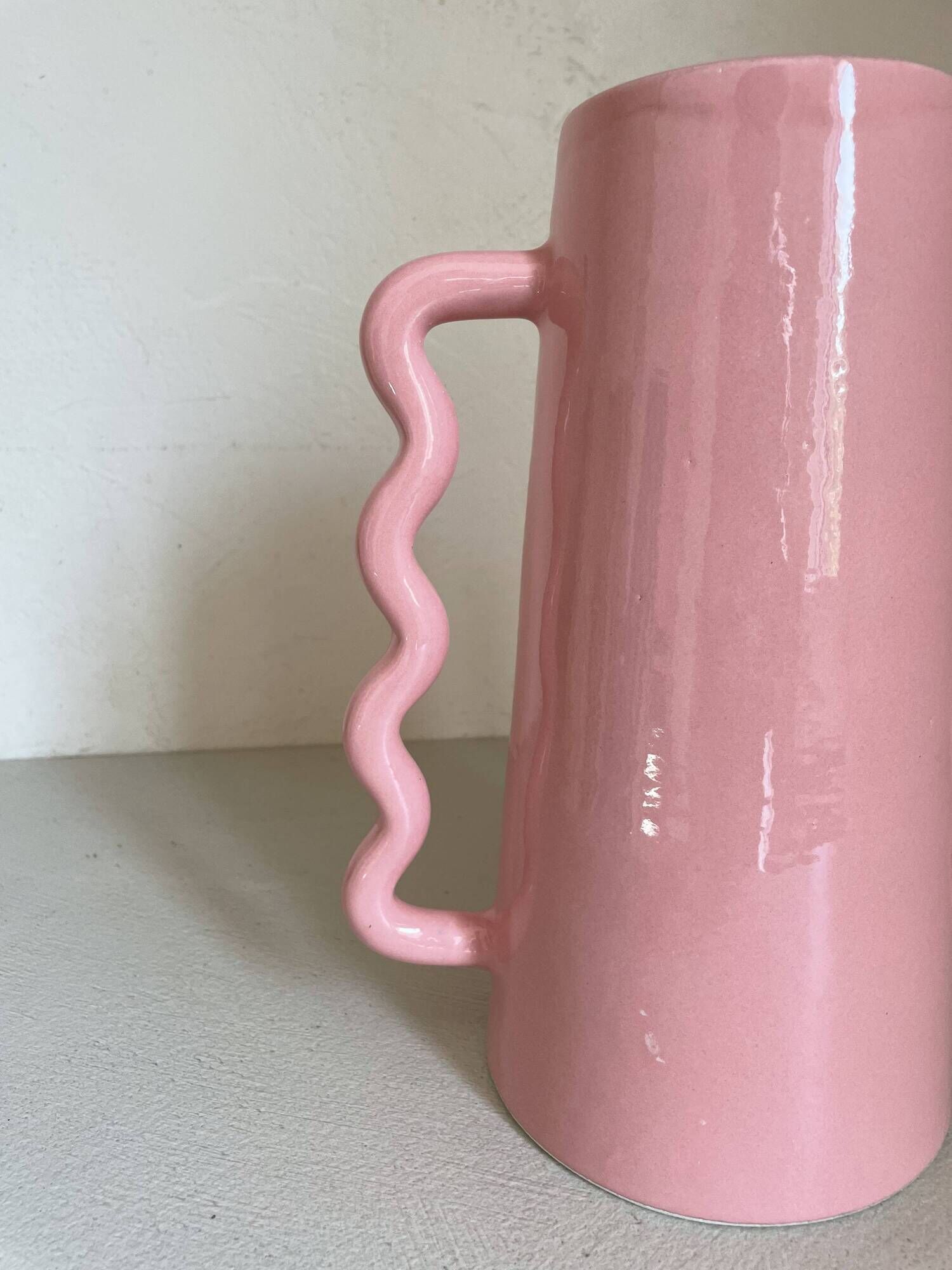 Handmade abstract corrugated handle pink ceramic vase