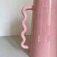 Handmade abstract corrugated handle pink ceramic vase
