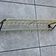Coat rack in the style of a train luggage rack, length = 79 cm.