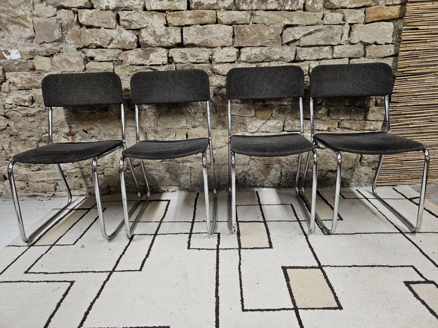 Set of four vintage 1970 sled chairs